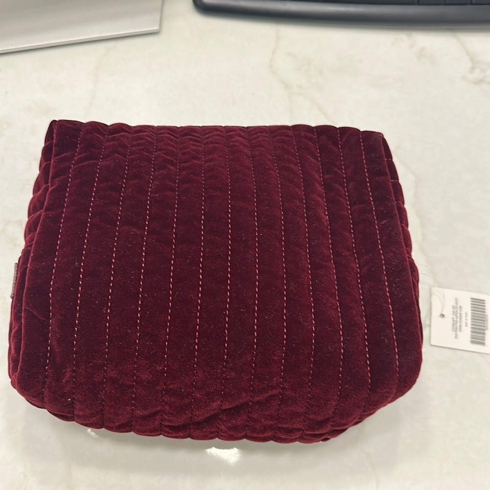 NWT. Cos Bar. Burgundy velvet makeup bag. Never used.